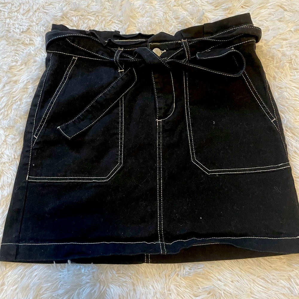 Black skirt with white lining/stitching
